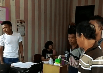 Tersangka pelaku pemerkosaan di Tobasa saat di kantor polisi