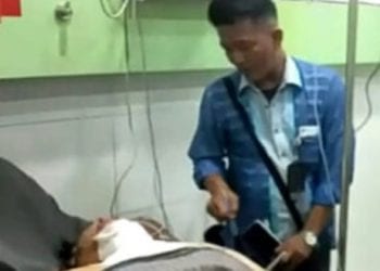 Pemilik toko kelontong di Batubara yang jadi korban perampokan saat di rumah sakit.