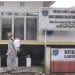 Petugas saat melakukan penyemprotan disinfektan di area Kantor Dinas Kominfo.