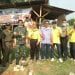 Camat Rantau Utara saat menghadiri peletakan batu pertama pembangunan Poskamling di Aek Paing.