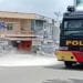 Water Canon yang digunakan untuk menyemprot desinfektan di jalanan kota Tanjungbalai.