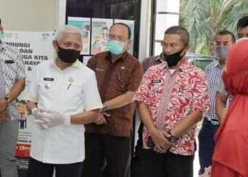 Bupati Bagikan APD Bantuan Provsu ke Puskesmas se-Kabupaten Asahan