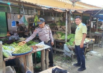 Polsek Pantai Cermin Pantau Ketersedian Sembako di Pasar Tradisional