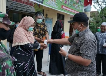 Sekdakab Asahan Serahkan Bantuan APD ke Puskesmas