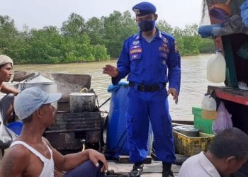 Sosialisasi Covid-19, Sat Pol Airud Ajak Nelayan Bagan Kuala Patuhi Protokol Kesehatan