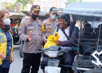 Polres Tanjungbalai Bersama Lions Club Medan Bagikan Bansos ke Masyarakat