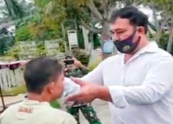 Aiptu Iwan Tarigan Bantu Parbetor Beli Masker