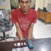 (Ignatius Siagian/taslabnews) Tersangka Zulheri Sirait alias Heri alias Hendra (34) berikut dengan barang buktinya saat diamankan di Polres Tanjungbalai.