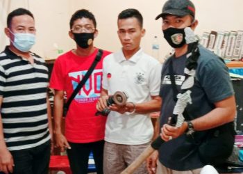 (Ignatius Siagian/taslabnews) Tersangka M Sajami Alim alias Jami saat diamankan di Polsek Datuk Bandar, Polres Tanjungbalai.