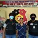 Tersangka saat diamankan polisi