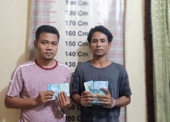 Tandai Wajahnya, Dua Pria Ini Cetak dan Edarkan Uang Palsu Pecahan Rp50 Ribu
