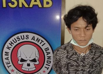 (Ignatius Siagian/taslabnews) Tersangka Ilham alias Lindung tersangka kasus pencurian dengan pemberatan