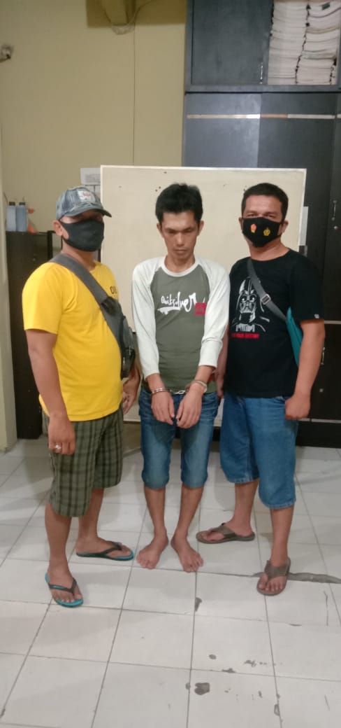 (Ignatius Siagian/taslabnews) Tersangka Ibrahim Saragi alias Ilham (38) saat diamankan di Polres Tanjungbalai.