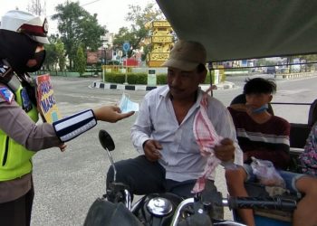Sat Lantas Polres Tanjungbalai Kembali Bagi-bagi Masker Gratis ke Warga