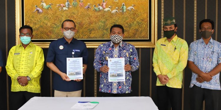 Walikota Tanjungbalai, H M Syahrial saat melakukan perubahan atau addendum peserta BPJS Kesehatan menjadi 45.000 orang.