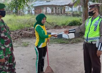 Operasi Keselamatan Toba 2021, Sat Lantas Polres Tanjungbalai Bagikan Masker Gratis