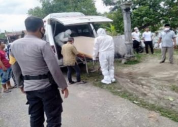 Polres Asahan Monitoring Pemakaman Jasad Pasien Covid-19