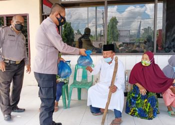 Sambut HUT Bhayangkara Ke-75, Polres Tanjungbalai Bagi-Bagi Paket Sembako