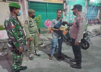 Gelar Patroli Skala Besar, Polres Asahan Bagi Paket Sembako pada Warga Terdampak Covid 19