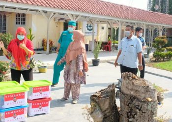 Peduli Perjuangan Nakes Covid-19, Kapolres Tanjungbalai Berikan Bantuan Sosial