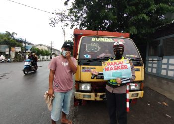 Bagikan Masker Gratis, Satlantas Polres Tanjungbalai Imbau Warga Agar Disiplin Pakai Masker