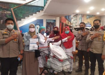 Polsek Kisaran Kota Vaksin Pengunjung Irian Super Market