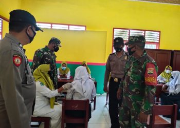 Kejar Herd Immunity, Polres Asahan Vaksinasi 1.450 Orang per Hari