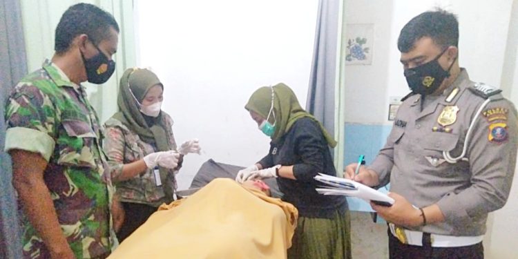 Korban Ervina Simarmata saat dirawat di Klinik Kesuma Bangsa.
foto/teks: sofyan butar butar