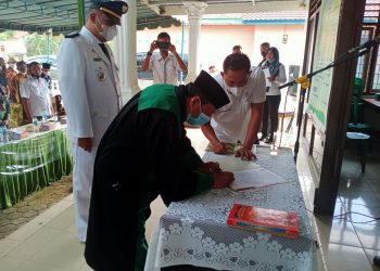 Kadis PMD Asahan Lantik Pejabat Kepala Desa Sumber Harapan
