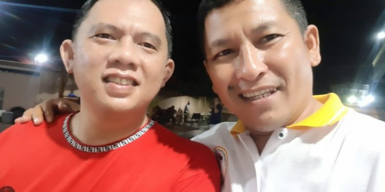 Bupati Labuhanbatu H Erik Adtrada Ritonga (kiri) bersama Ketua MOI Labuhanbatu Syaiful Bahri Ritonga (Kanan).