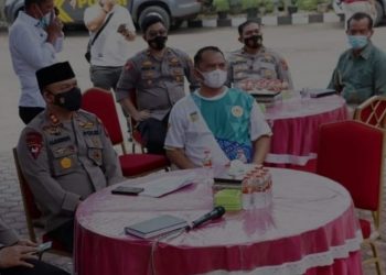 Kapolres Labuhanbatu AKBP Anhar Arlia Rangkuti (kiri), Bupati Labuhanbatu H Erik Adtrada Ritonga (kanan).