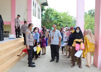 Polres Tanjungbalai Kawal Penyaluran BLT dan Vaksinasi Bagi Masyarakat di Kota Tanjungbalai