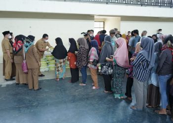 Pemkab Asahan Serahkan Bantuan 10 Ton Beras kepada Kaum Dhuafa