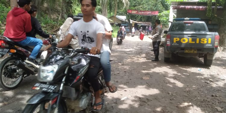 Personel Polsek Bandar Pulau  Gelar Pengamanan di Tempat Wisata