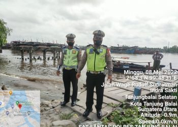 Personel Polres Tanjungbalai Gatur Lalin dan Amankan Tempat Wisata