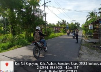 Personel Polsek Sei Kepayang Atur Lalulintas di Persimpangan Jalan