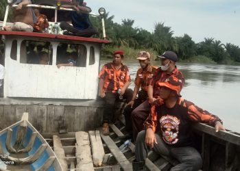 Pencarian terhadap korban yang tenggelam di sungai Asahan