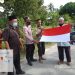 Kanit Binmas Polsek Air Joman Hadiri Gerakan Pembagian 10 Juta Bendera Merah Putih ke Warga
