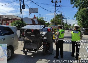 Amankan Ibadah Minggu, Satlantas Polres Tanjungbalai Laksanakan Gatur Lalin