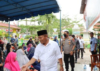 Kapolres dan Walikota Bersama Forkopimda Berikan Bansos Kepada Masyarakat Kota Tanjungbalai