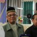 Bupati Labuhanbatu H Erik Adtrada Ritonga (kiri).