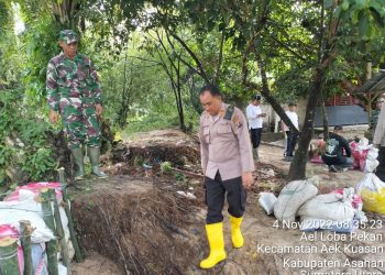 Lurah dan Kapolsek Pulau Raja Asahan Ajak Warga Gotong Royong