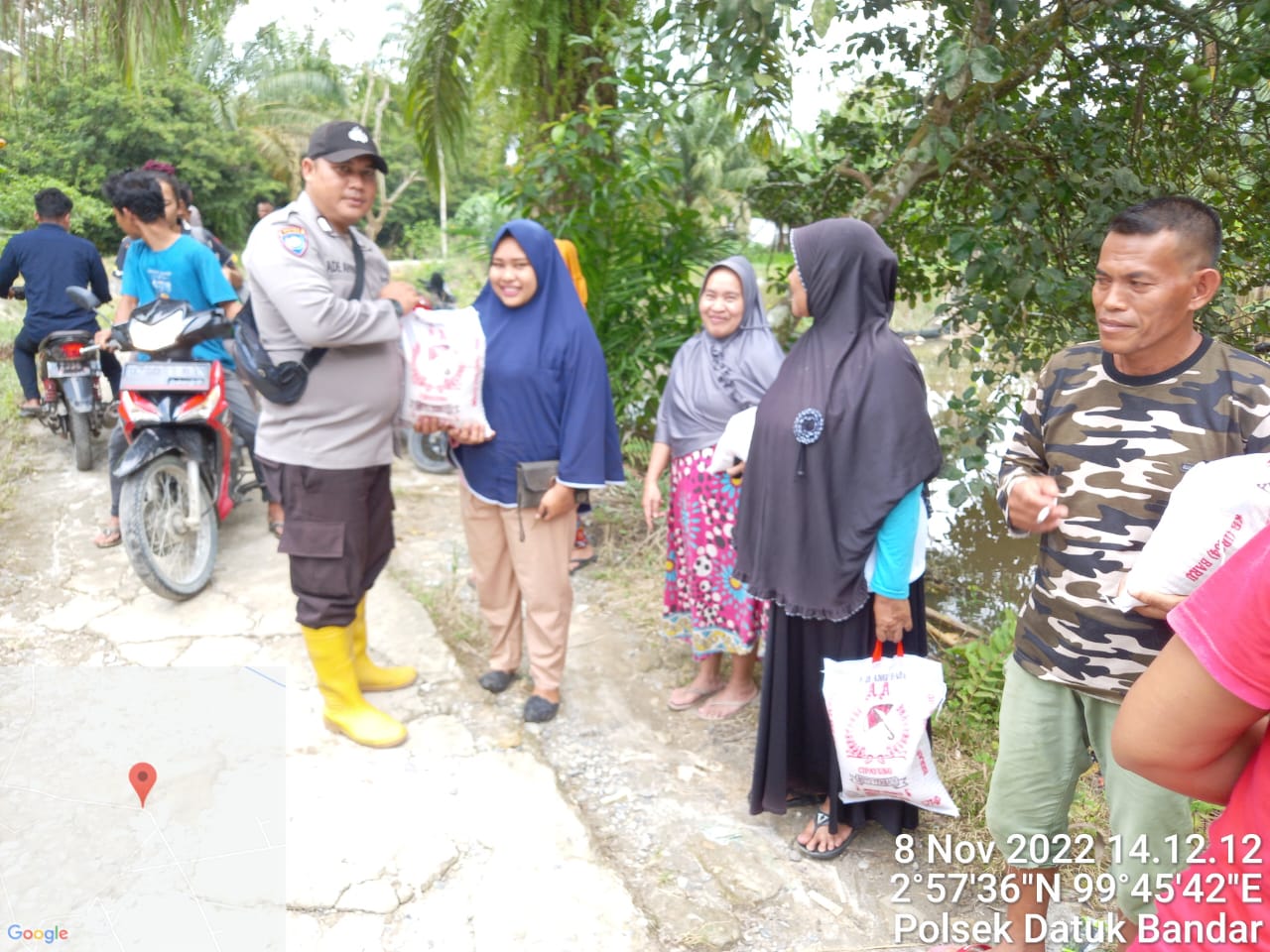 Polres Tanjungbalai Bantu Korban Banjir di Kecamatan Datuk Bandar