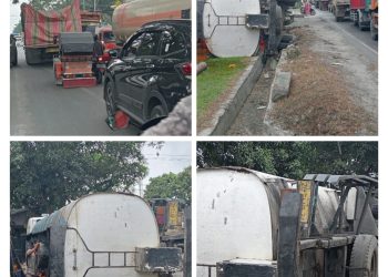 Truk Tangki CPO Terbalik depan Koramil 18 Meranti, Jalinsum Asahan-Medan Macet 