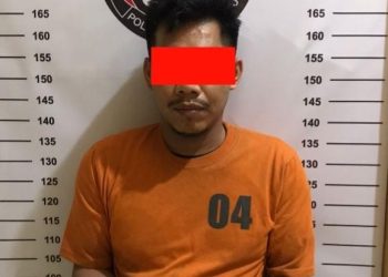 Salahseorang pelaku penyalahgunaan narkoba saat berada di kantor Polisi. 