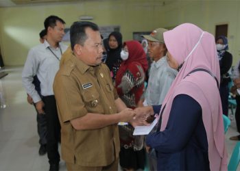 Pemkab Asahan Serahkan Buku Tabungan Pinjaman Bergulir ke 65 Pelaku Usaha