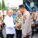 Kapolres Labuhanbatu AKBP James H Hutajulu saat menyambut kedatangan Gubernur Sumatera Utara Edy Rahmayadi.