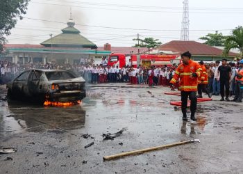 Mobil Sedan Terbakar di SPBU Mutiara Kisaran 