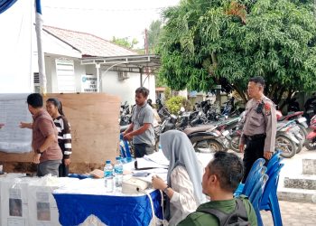 Kapolsek Kisaran Kota Lakukan Pengamanan Penghitungan Suara di Kecamatan Meranti