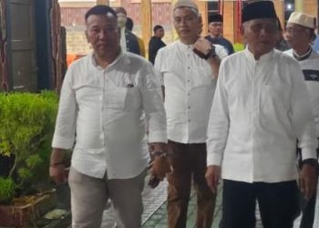 Ok Rasyid bersama Bupati Asahan Surya.